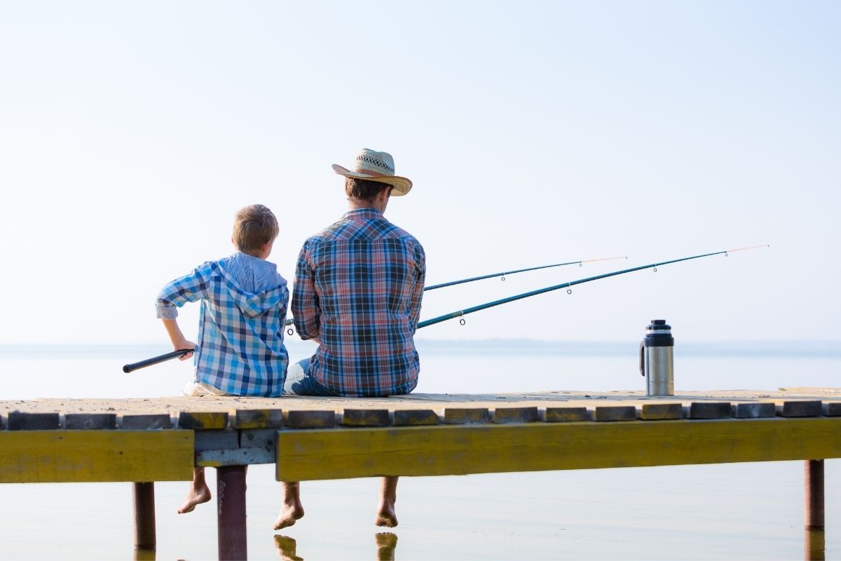father and son fishing together