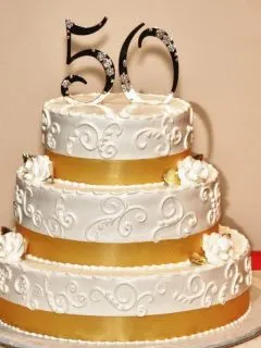 gold and white 50th birthday cake