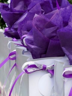 purple and white party favors