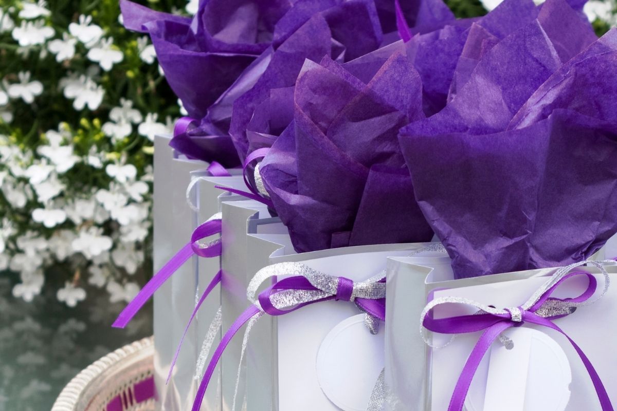 purple and white party favors