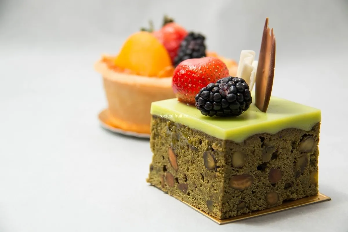 cake topped with troipical fruit