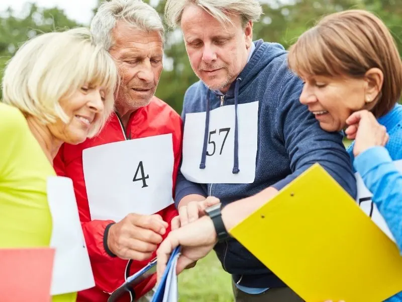 adults preparing for a scavenger hunt