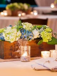 wooden box with flowers centerpiece