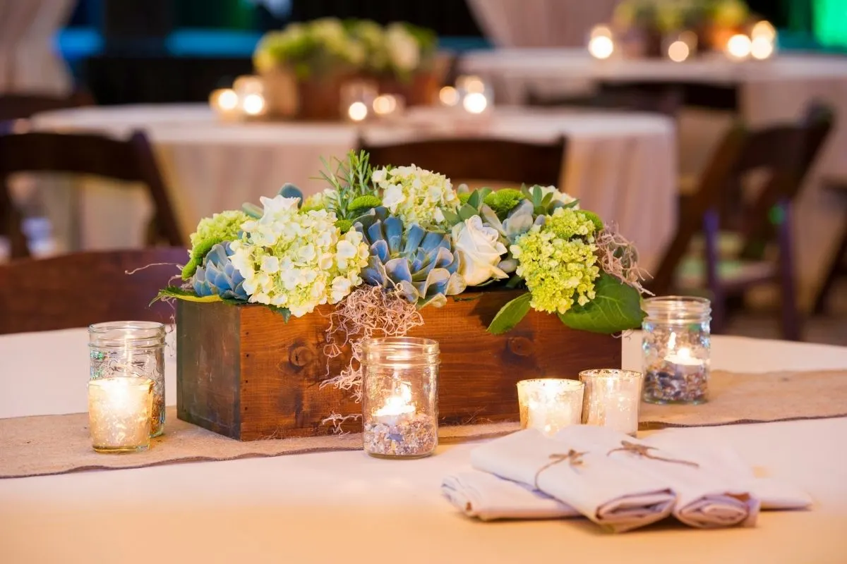 wooden box with flowers centerpiece