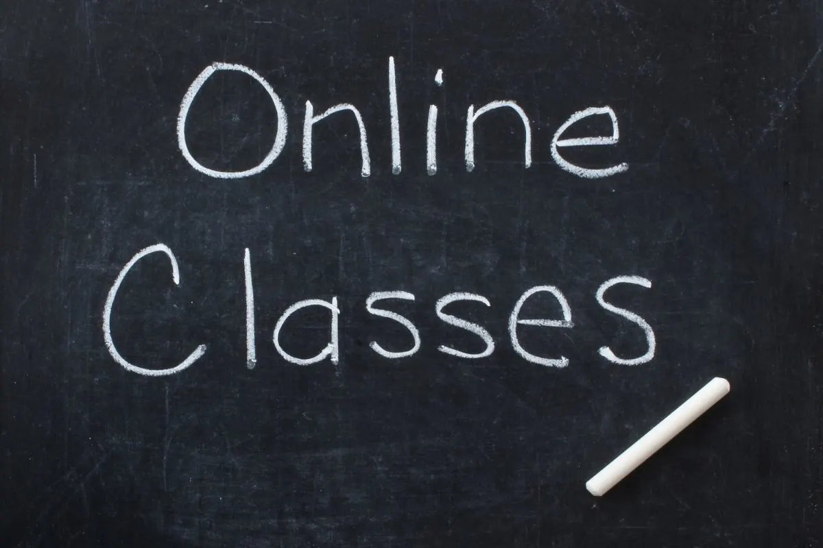 chaklboard with the words online classes in white chalk