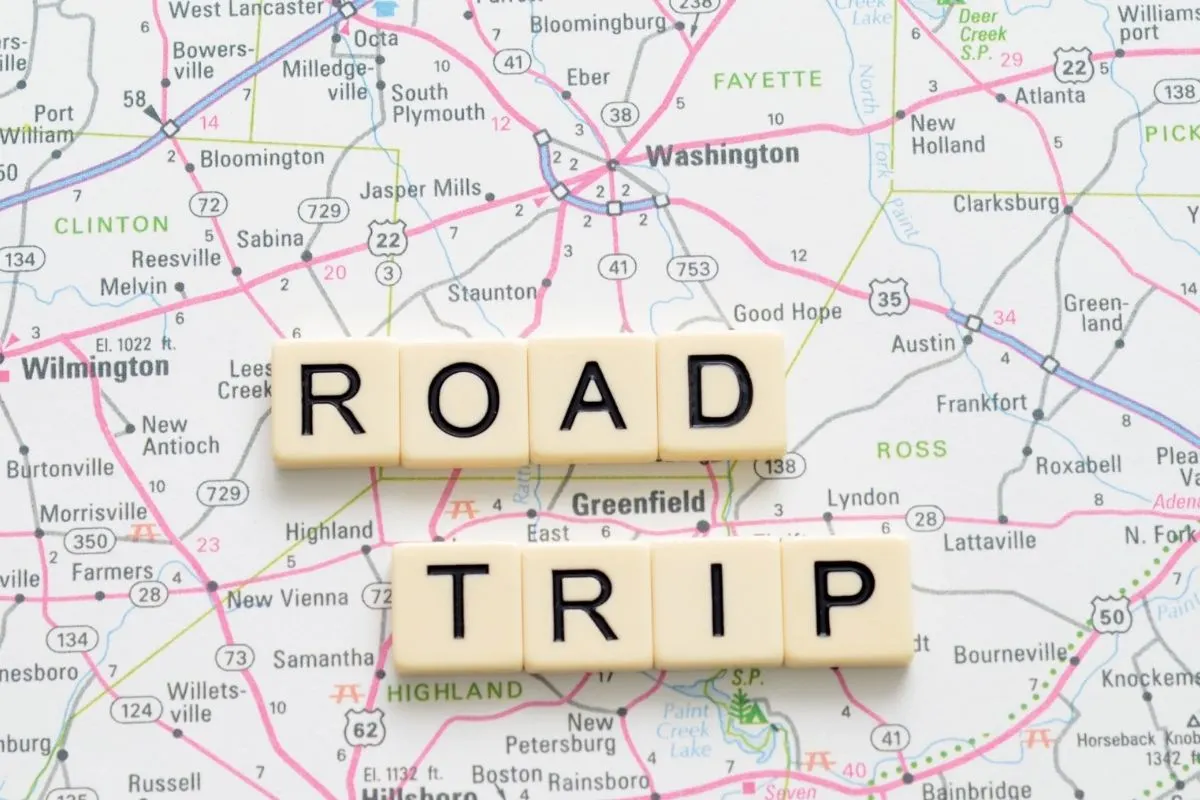 a map with road trip words made out of tiles