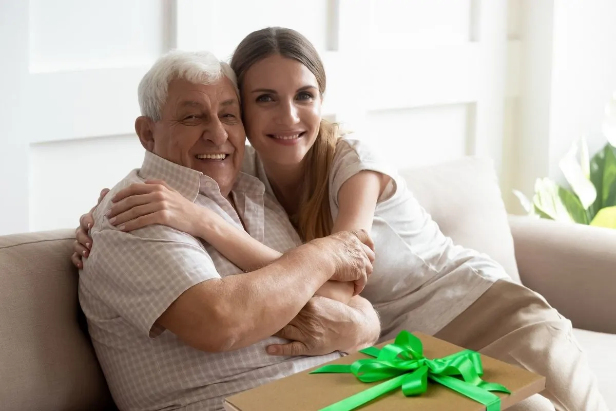 father and daughter hugging 