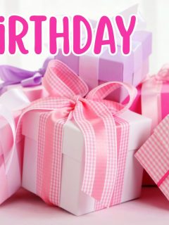 a pile of gifts wrapped in pink paper for a 30th birhtday.